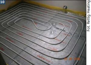 Jak obliczyć, ile pętli podłogówki potrzeba w salonie o powierzchni 30 m2?