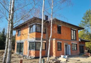 Najlepsze kolory elewacji, które doskonale współgrają z czekoladowym dachem